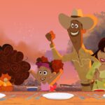 A scene of a Black family celebrating from the “Old Towne Road Part II episode of “The Proud Family: Louder and Prouder.” (Disney) On the left is an autistic boy with an afro, with his sister in a pink dress next to him, his father in a cowboy hat, and his mother in a yellow suit